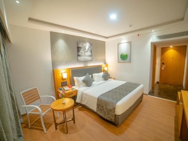 Zip By Spree Hotels Chakan : photo 2 de la chambre chambre deluxe double ou lits jumeaux