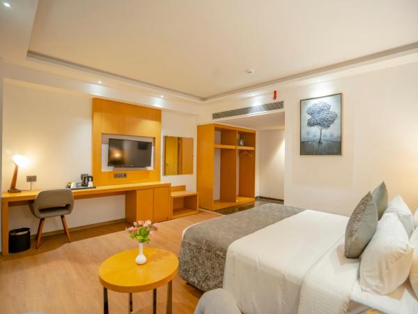 Zip By Spree Hotels Chakan : photo 5 de la chambre chambre lit king-size