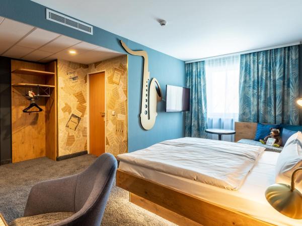 mightyTwice Hotel Dresden : photo 3 de la chambre chambre double lit queen-size - cosy