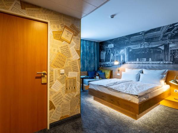 mightyTwice Hotel Dresden : photo 1 de la chambre chambre double lit queen-size - cosy