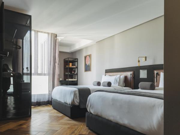 The Wild Oscar : photo 4 de la chambre chambre supérieure avec 2 lits queen-size