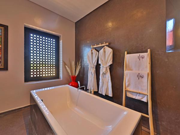 DAR NOUJOUM : photo 6 de la chambre chambre double deluxe avec baignoire