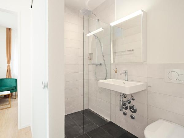 EH Apartments Merkur : photo 10 de la chambre suite deluxe avec lit king-size