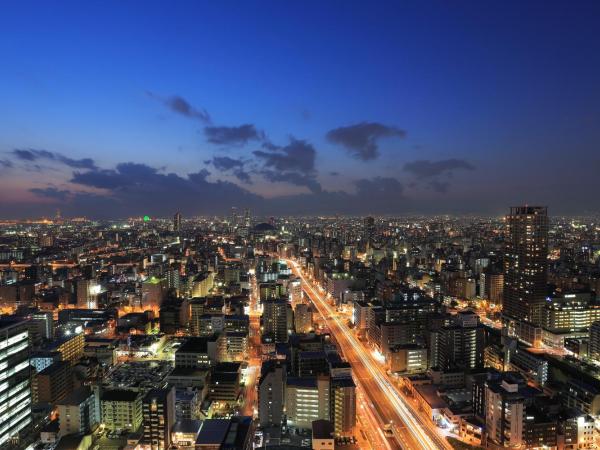Hotel Monterey Grasmere Osaka : photo 1 de la chambre queen room with city view  - non-smoking 