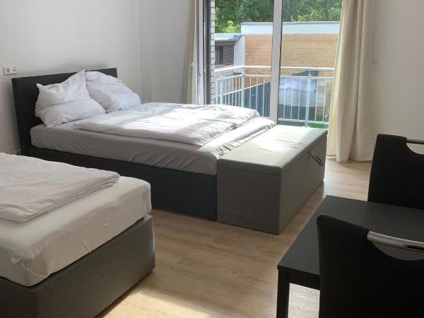 AT-Rooms : photo 1 de la chambre chambre triple