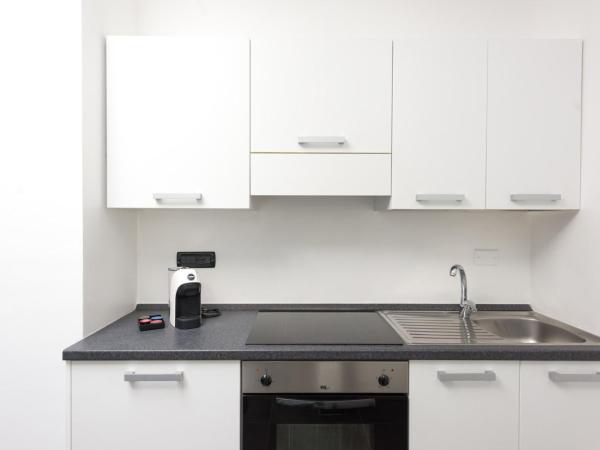 TURINHOMETOWN Residence Apartments : photo 7 de la chambre appartement avec terrasse