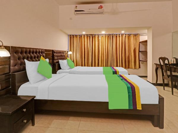 Treebo White Inn Koramangala : photo 8 de la chambre [sanitized] deluxe double room