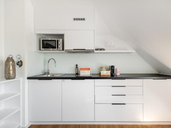 numa I Munico Apartments : photo 5 de la chambre extra large studio with kitchenette and sofa bed - duplex