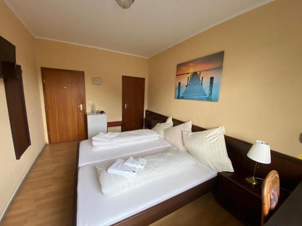 Taverna Hotel Römerkrug : photo 1 de la chambre chambre double standard