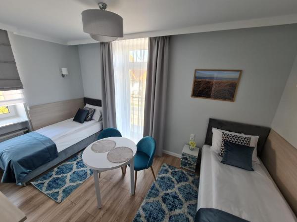 Villa Babette - Ubernachtung, Parkplatz, Kurtaxe, Wifi, Aufraumung - Alles im Preis! : photo 1 de la chambre appartement