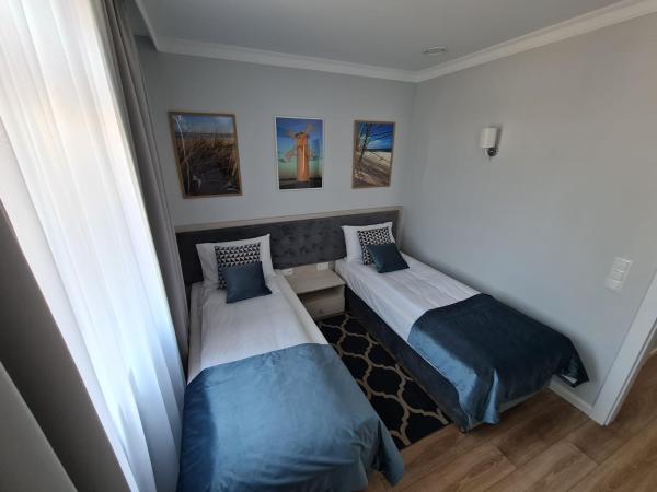 Villa Babette - Ubernachtung, Parkplatz, Kurtaxe, Wifi, Aufraumung - Alles im Preis! : photo 2 de la chambre appartement