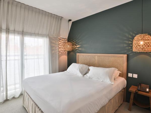 Hotel & Spa Les Roches Noires : photo 1 de la chambre chambre familiale