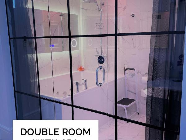 Seafront419 By Seafront Collection : photo 2 de la chambre chambre double avec baignoire spa