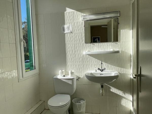 Hotel Thalassa : photo 3 de la chambre chambre lits jumeaux - vue sur jardin