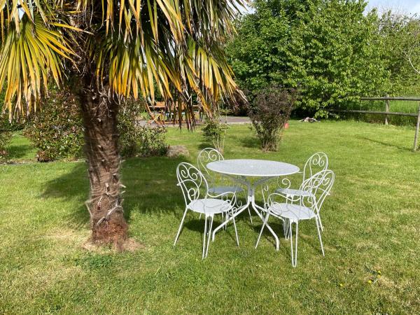 Aux murmures de la nature : photo 8 de la chambre chambre double - vue sur jardin