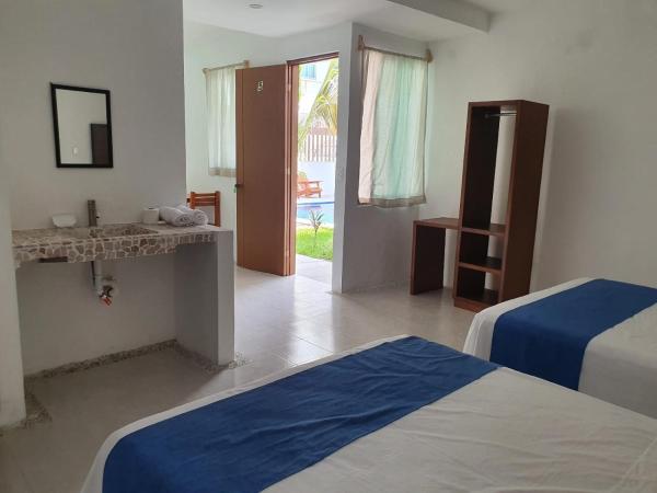 Riviera Bonfil : photo 10 de la chambre chambre deluxe avec 2 lits queen-size