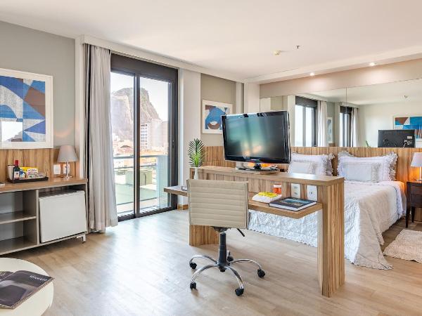 Pestana Rio Atlantica : photo 3 de la chambre suite junior - vue latérale sur mer