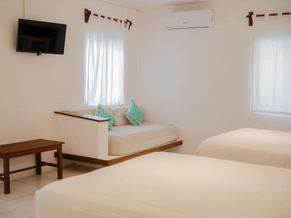 Na Balam Hotel : photo 5 de la chambre hébergement double standard avec 2 lits doubles - côté piscine