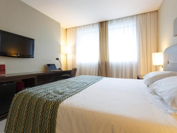 Mercure Salvador Pituba : photo 2 de la chambre chambre lits jumeaux supérieure avec balcon