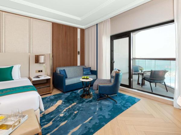 Taj Exotica Resort & Spa, The Palm, Dubai : photo 4 de la chambre chambre familiale lit king-size de luxe - vue sur mer