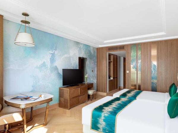 Taj Exotica Resort & Spa, The Palm, Dubai : photo 2 de la chambre chambre lits jumeaux exotica avec accès au salon club, goûter et cocktails en soirée - vue sur mer