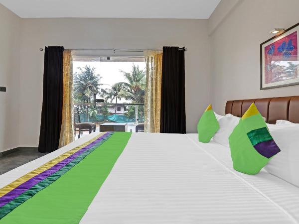 Treebo Grand Vistara Airport Suites : photo 1 de la chambre chambre double supérieure