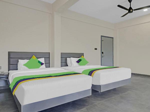 Treebo Grand Vistara Airport Suites : photo 10 de la chambre chambre double supérieure