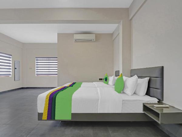 Treebo Grand Vistara Airport Suites : photo 9 de la chambre chambre double supérieure