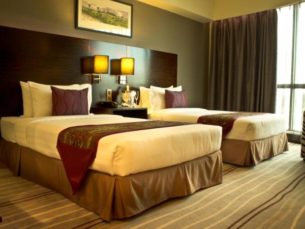 Ming Garden Hotel & Residences : photo 5 de la chambre chambre deluxe double ou lits jumeaux