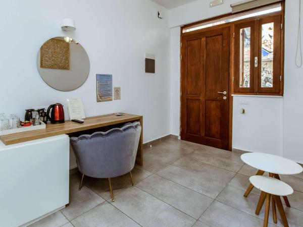 Deluxe Hotel : photo 6 de la chambre chambre triple basique - rez-de-chaussée