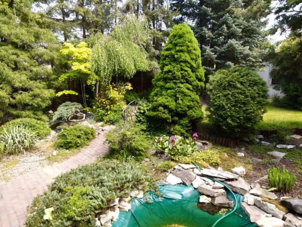 Pokoje Rezydencja Parysa : photo 2 de la chambre chambre lit queen-size avec salle de bains commune