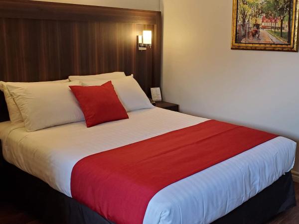 Hotel et Motel Le Chateauguay : photo 9 de la chambre chambre supérieure lit queen-size