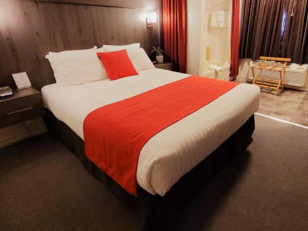 Hotel et Motel Le Chateauguay : photo 10 de la chambre chambre supérieure lit queen-size