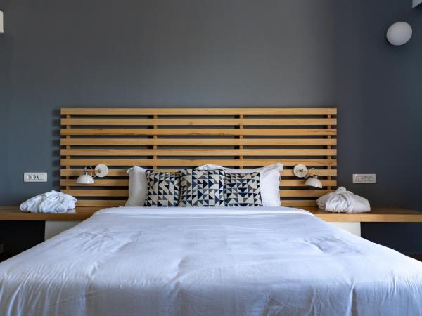 Anamnesis City Spa : photo 2 de la chambre chambre triple de luxe avec bain à remous