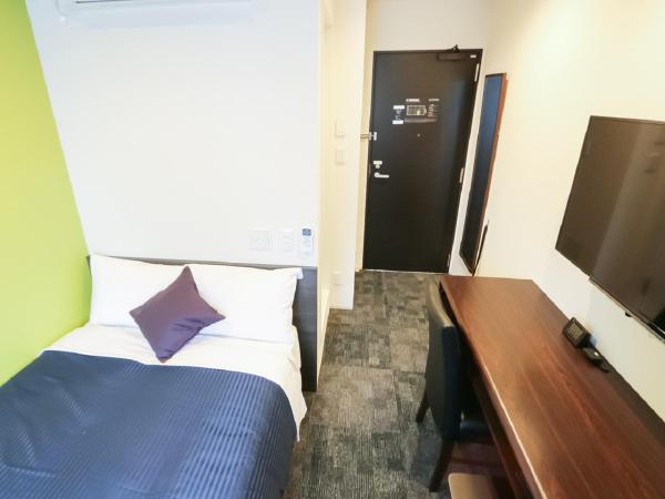 HOTEL LiVEMAX Niigata Ekimae : photo 1 de la chambre chambre double avec petit lit double - non-fumeurs
