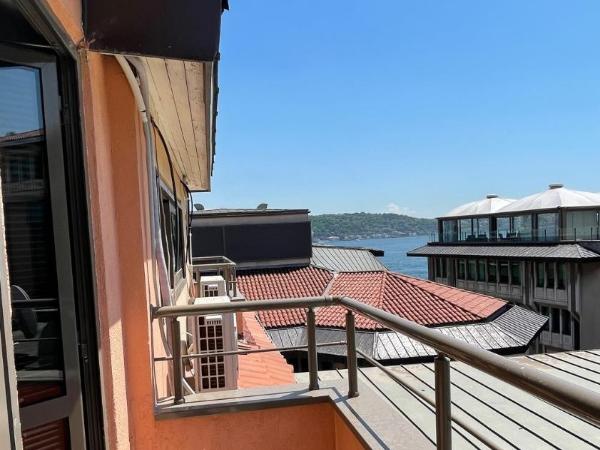 Feri Suites : photo 2 de la chambre chambre double deluxe - vue latérale sur mer