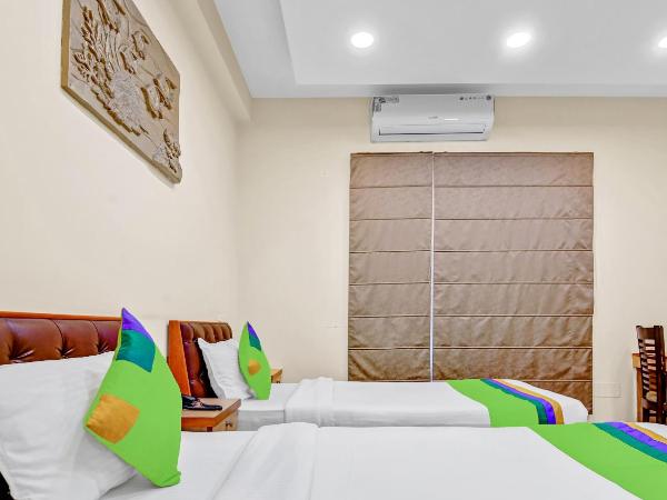 Treebo Sai Village Gold Souk - Sec 43 : photo 4 de la chambre chambre double deluxe