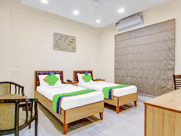 Treebo Sai Village Gold Souk - Sec 43 : photo 9 de la chambre chambre double deluxe