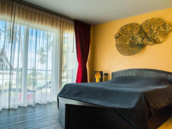 Shambhala Beach Resort : photo 5 de la chambre suite 3 chambres