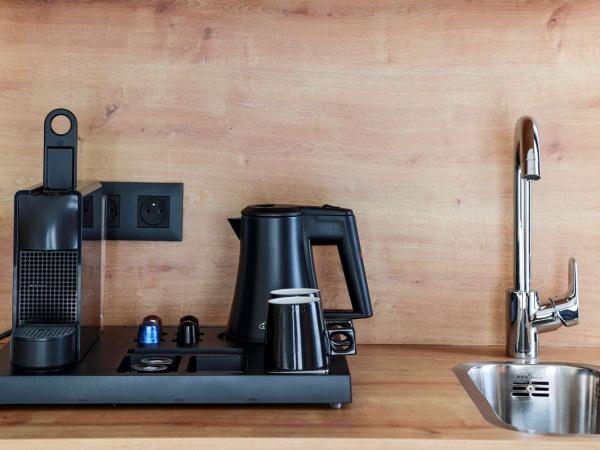 Radisson Hotel Liege City Centre : photo 2 de la chambre chambre supérieure - balcon et kitchenette