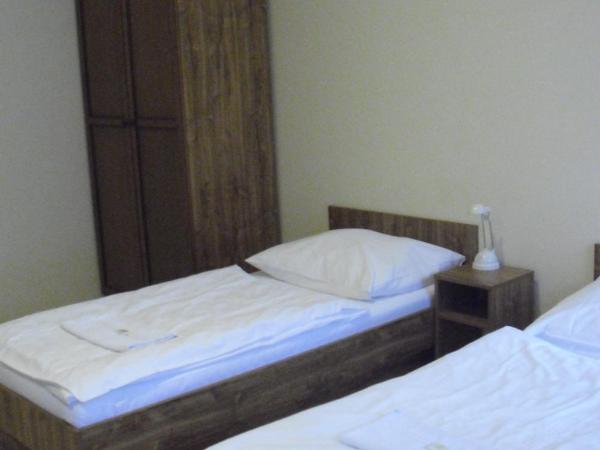 Restaurant Švejk a Pension Brno : photo 4 de la chambre chambre double ou lits jumeaux