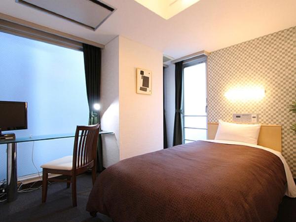 HOTEL LiVEMAX BUDGET Korakuen : photo 10 de la chambre chambre lits jumeaux de luxe - fumeurs