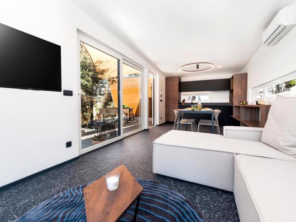 Porton Nature Hideouts : photo 9 de la chambre maison de vacances familiale 2 modules avec piscine