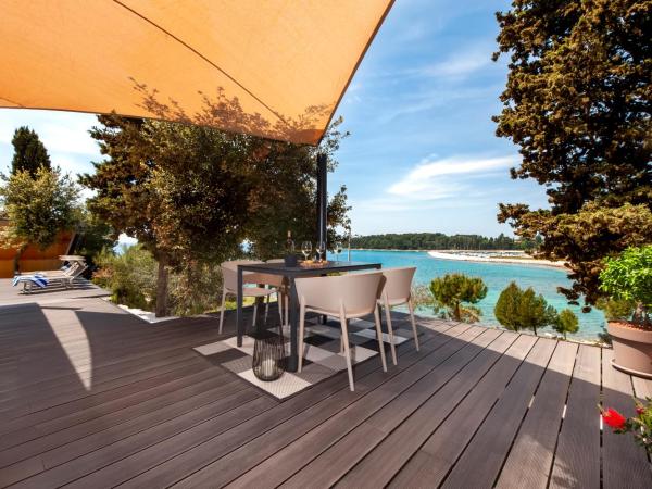 Porton Nature Hideouts : photo 3 de la chambre maison de vacances familiale 2 modules avec piscine