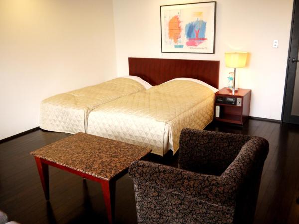 The Residential Suites Fukuoka : photo 1 de la chambre chambre lits jumeaux moyenne - fumeurs