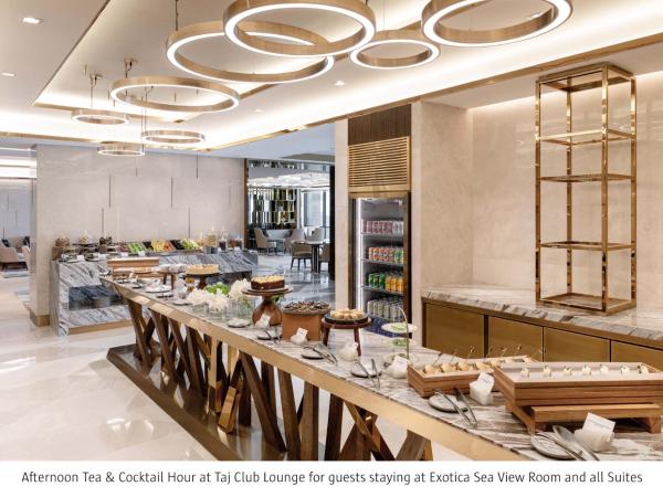 Taj Exotica Resort & Spa, The Palm, Dubai : photo 6 de la chambre chambre lit king-size exotica avec accès au salon club, goûter et cocktails en soirée - vue sur mer