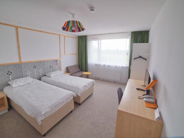 Arche Hotel Poloneza : photo 5 de la chambre grande chambre simple 