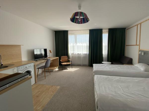 Arche Hotel Poloneza : photo 7 de la chambre grande chambre simple 