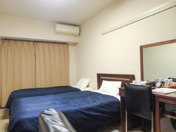 HOTEL LiVEMAX BUDGET Nagoya : photo 6 de la chambre chambre lits jumeaux - fumeurs