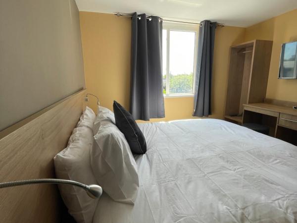 Tinapa Suites : photo 5 de la chambre chambre lit king-size deluxe